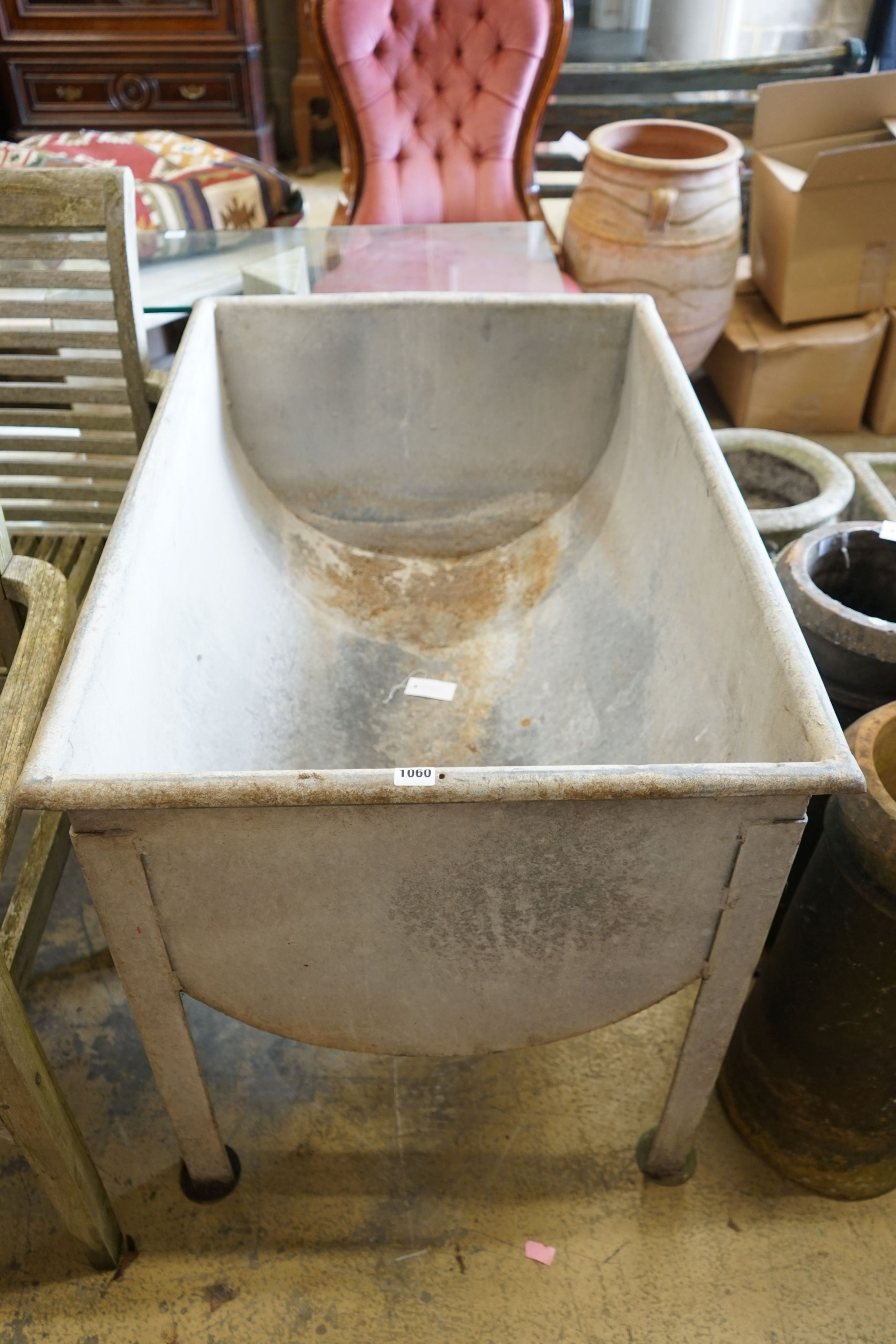 A rectangular galvanised metal water trough, length 97cm, depth 66cm, height 77cm